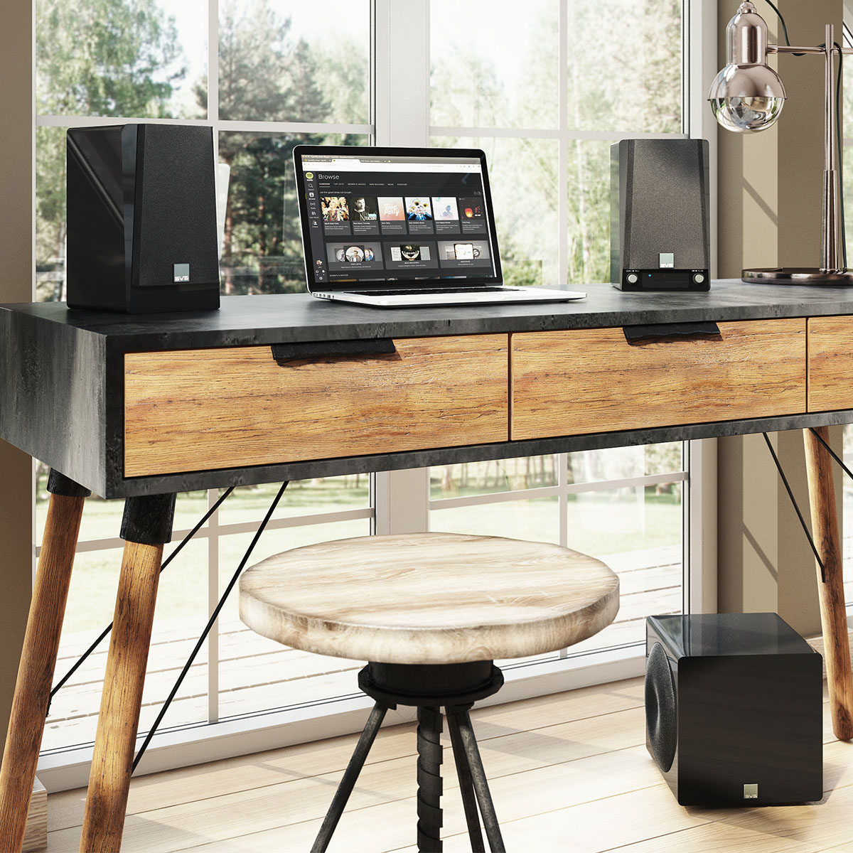SVS 3000 Micro Subwoofer system with desk and laptop
