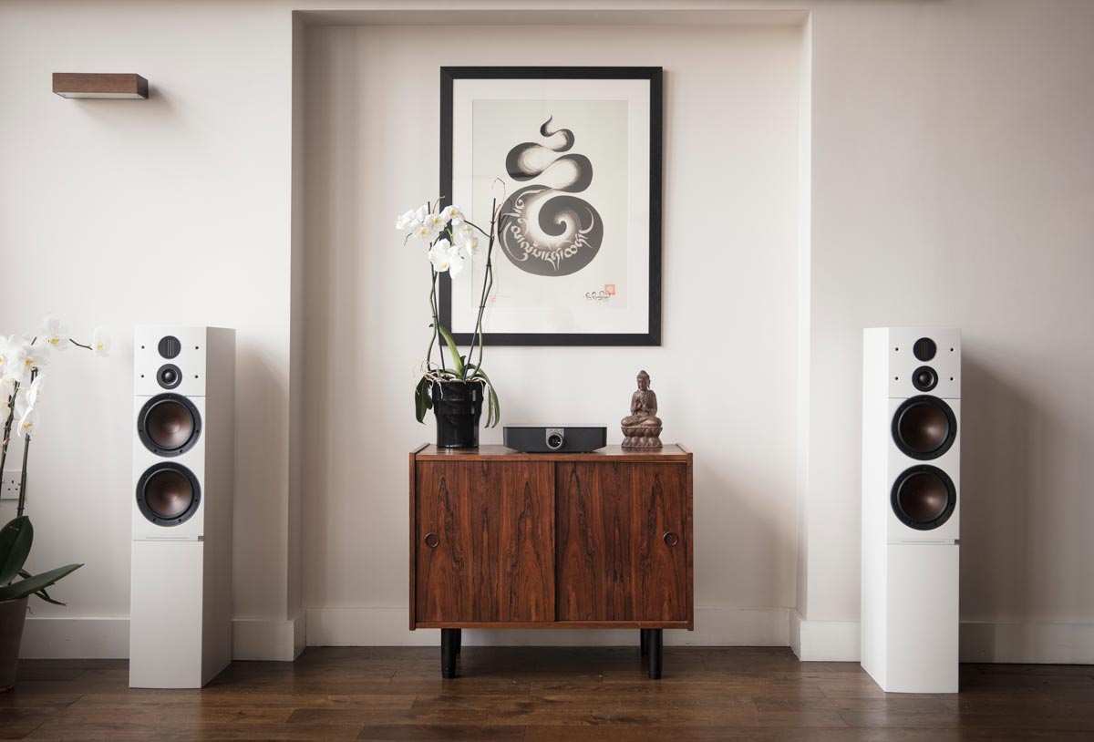 Modern living room with stereo and DALI speakers