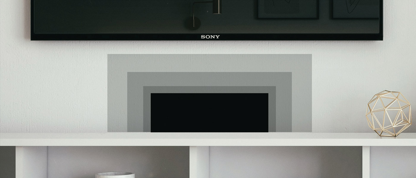 Mantle with mocked up sizes of potential receivers under Sony tv